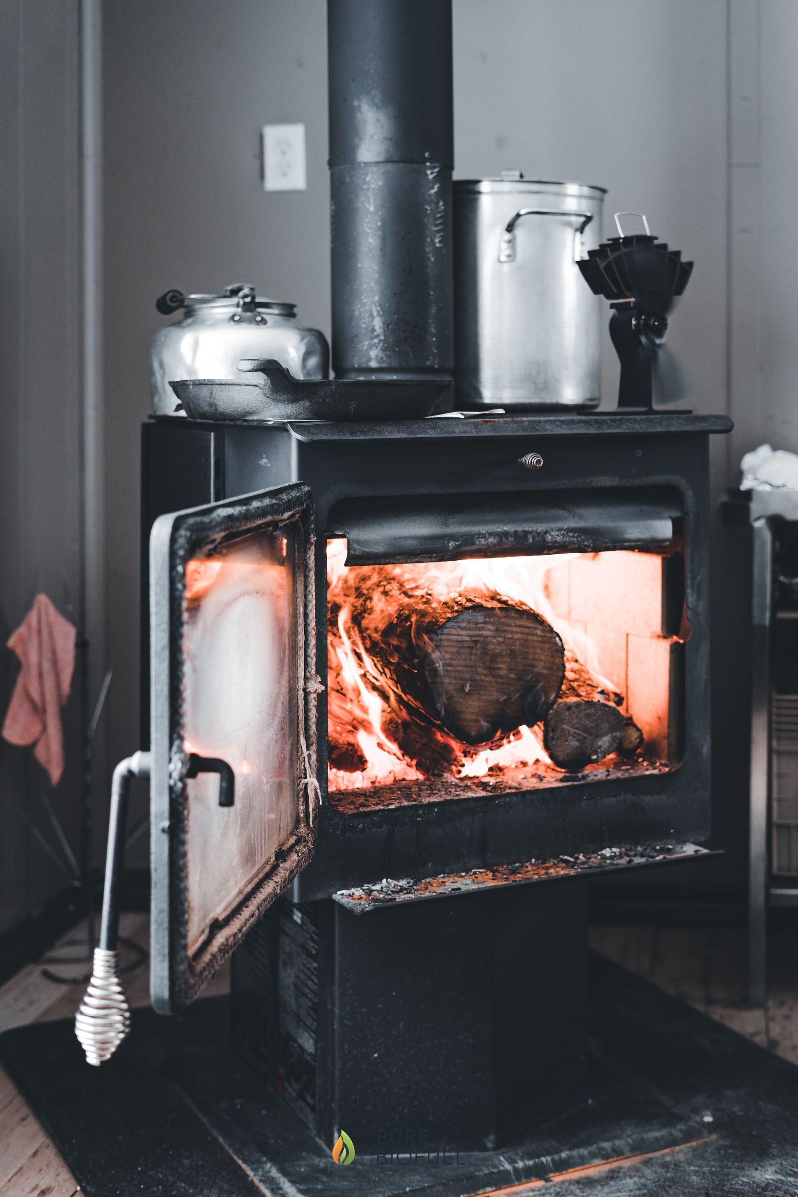 Cozy living room heated by a wood-burning stove on a cold winter day